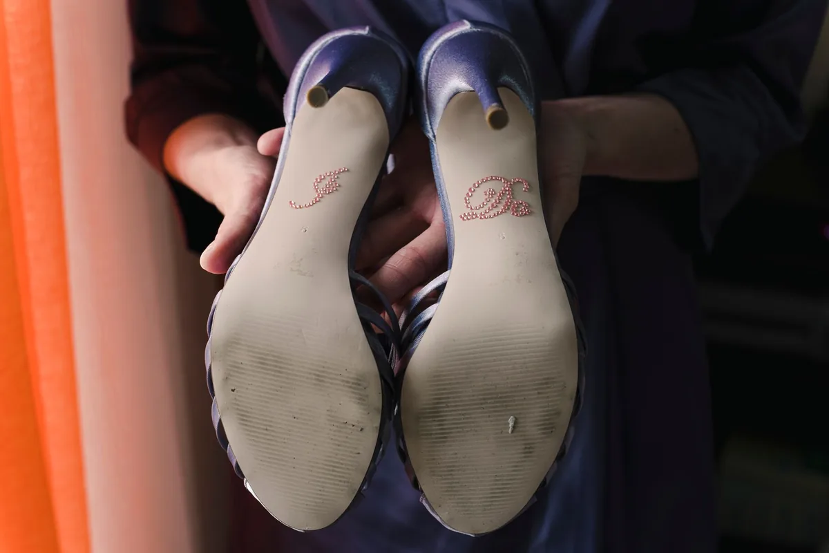 Break shoes in early, and on the surfaces you will actually walk on.